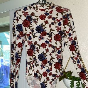 Long sleeved body suit